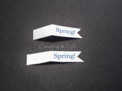 recycled egg carton mini spring baskets, crafts, Print the word Spring on your home printer or hand write and cut into tiny flag shapes Glue to the paper clip handle of your mini basket