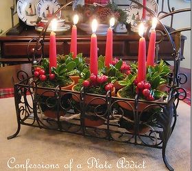 fun and easy christmas candle favorites, seasonal holiday d cor, A 10 thrift store basket plus a few flower pots candles and greenery from my yard add up to a pretty and natural Christmas centerpiece