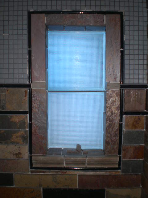 idea for master bathroom renovation, bathroom ideas, tiling, I found two old glass blocks 12x12 at a surplus store here and decided to install them inside the shower for a little extra light