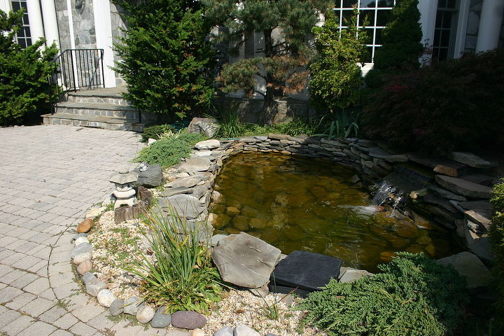 our most recent project pondless waterfall rainxchange system, doors, outdoor living, ponds water features, Before a poorly built pond that was always green