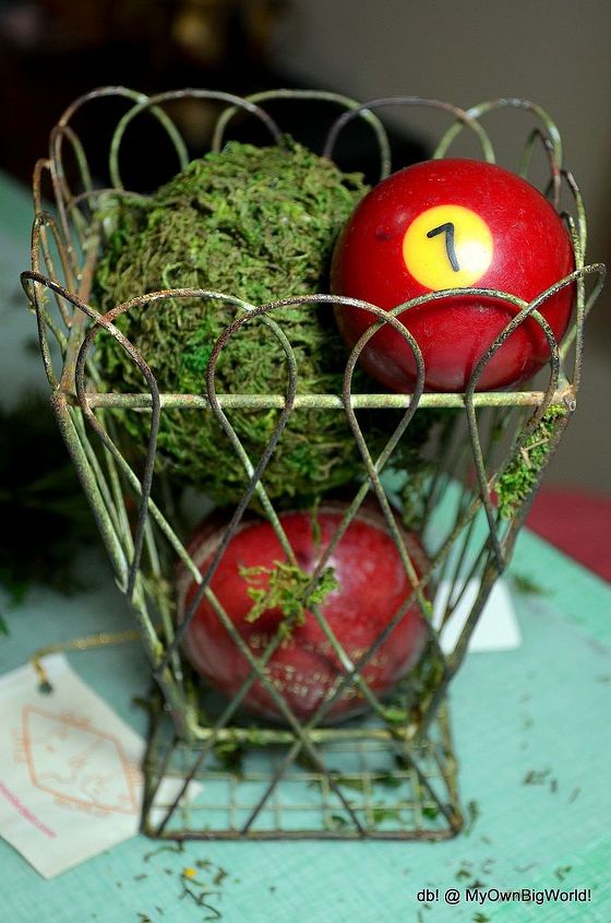 updated upcycle basket, crafts, repurposing upcycling, I picked most of the moss off the basket leaving just enough for add character I then put my moss ball in along with a couple of vintage sporting balls