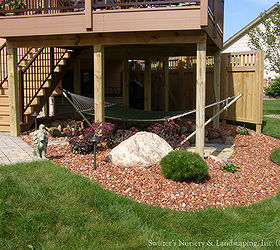 outdoor bonus room take full advantage of all the space in your yard and, decks, gardening, landscape, outdoor living, patio, Incorporating the space under the deck can make the maintenance that much easier The space can be delightful and pleasing to look at as part of the landscape