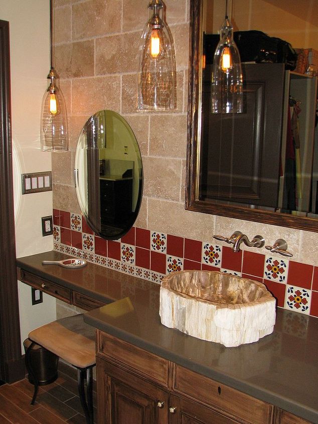 art deco master bath transforms into a spanish hacienda retreat, architecture, bathroom ideas, home decor, home improvement, We extended the stone wall look from the shower around the room to enhance the Spanish revival hacienda feel The petrified wood vessel sinks may not be historically accurate but the do add a wow factor