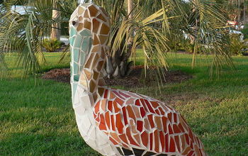 Let's celebrate garden art. This mosaic pelican created by an Orlando artist welcomes guests to my front door.