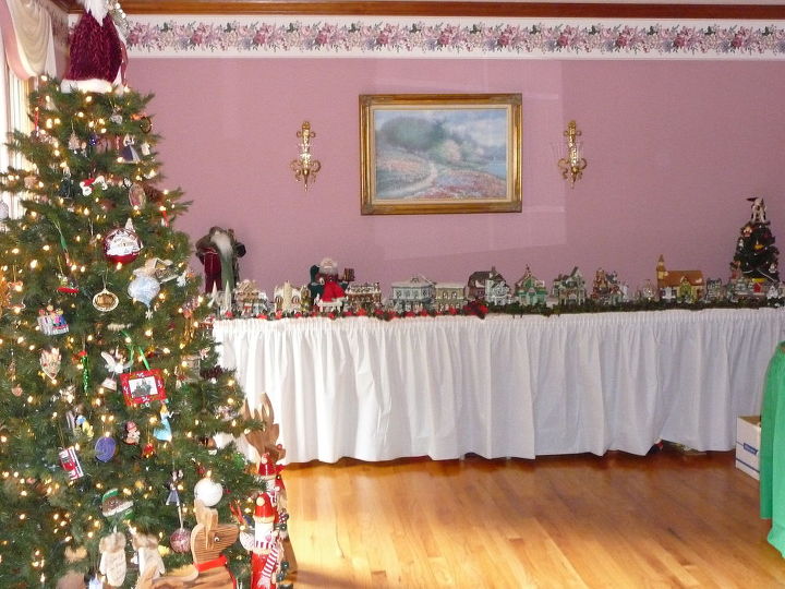 my client loves christmas this christmas room was set up all year long i, home decor, painted furniture, windows, Before Christmas room needs to be updated with paint desk chair flags diplomas and memorabil