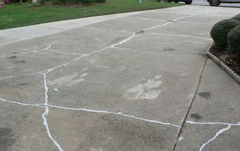 We have had inquiries relative to driveway resurfacing.  Here is a before and after look at such a project.