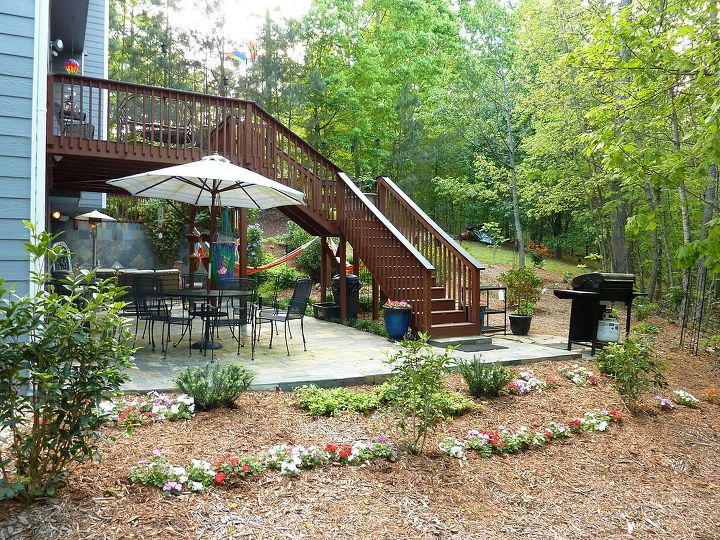 new updated pictures of the deck and decked out and ready for spring, decks, home improvement, outdoor living, patio, New Tea Olives and Yews with impatiens in between ready for Spring and Summer