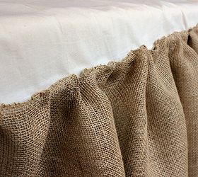 how to make a burlap bed skirt, bedroom ideas, crafts, home decor, I pinned the burlap ribbon to each end and to the middle of the existing bed skirt I pinched and pinned it all down Then I sewed it right on top of the bedskirt I used an entire roll for each side and half a roll for the end