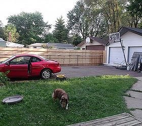 new privacy fence, diy, fences, how to, outdoor living, Want to see it again I do Hi Maxine The door of the car is open because my son wanted to sit in it Ten bucks says his sister is going to have to drive him around in that car