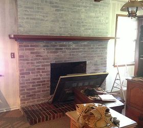 transform a brick fireplace with a white wash before after, concrete masonry, fireplaces mantels, painting, You can see one layer of 2 1 whitewash below the mantel and a second coat of 1 1 above the mantel