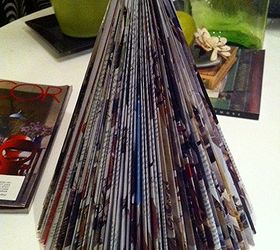 old magazines turned into christmas trees using simple origami, christmas decorations, crafts, seasonal holiday decor, Do this for about 30 45 minutes and you end up with a magazine tree