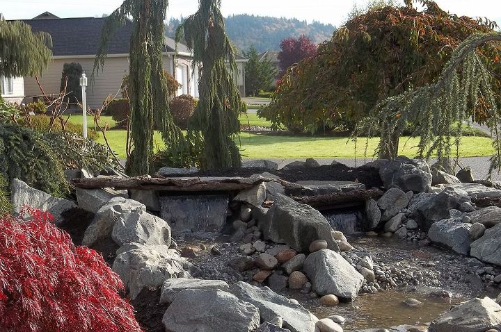 using logs to make your water feature pop, outdoor living, ponds water features