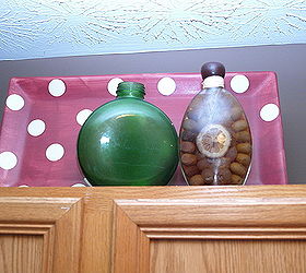 above cabinet decor, home decor, bottles colored glass or vases are also interesting items that can be placed above the cabinet