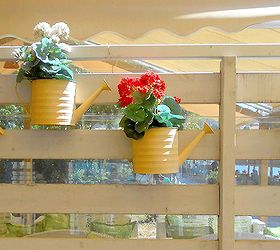 creative planters ideas for garden and balcony, curb appeal, flowers, gardening, repurposing upcycling, watering cans and pallets in Kastoria