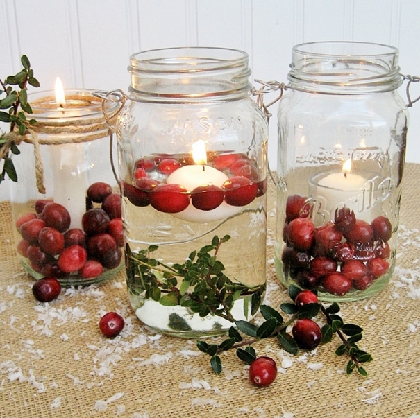 practically free mason jar candles for every season, home decor, mason jars, repurposing upcycling, Cranberries and boxwood sprigs ass a Christmasy feel