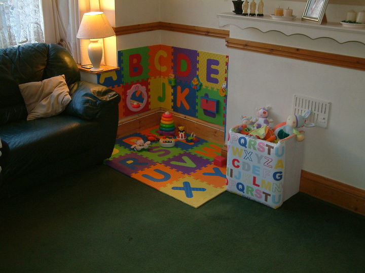 a babys play corner in the living room, home decor, living room ideas, A nice safe playarea