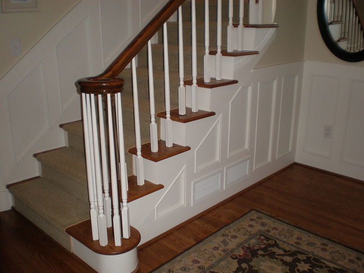 wainscotting in foyer, With new wainscotting carpet runner on stairs and new hardwood floors