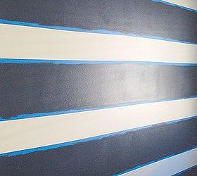creating a focal wall with painted stripes, bedroom ideas, home decor, painting, Roll on the stripe color over your taped background After it dries for several hours paints vary so make sure to check the can remove your painter s tape