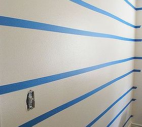 creating a focal wall with painted stripes, bedroom ideas, home decor, painting, The hardest part about creating painted stripes is the measuring and taping Make sure to measure accurately using a level helps Also make sure you choose a good painter s tape It will save a lot of touch ups later on