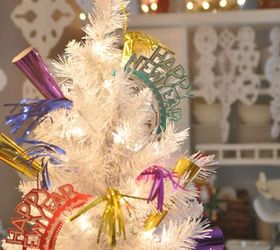 new years decorating ideas, seasonal holiday d cor, Don t get rid of your tree yet Add some fun party favors from the Dollar Store for a festive look Source DomesticFashionista com