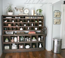 we re in the process of transforming our kitchen on a budget to fit our style we, home improvement, kitchen backsplash, kitchen design, kitchen island, I love this old chunky piece as use as a Butler s pantry Storage for good dishes cookbooks and spices
