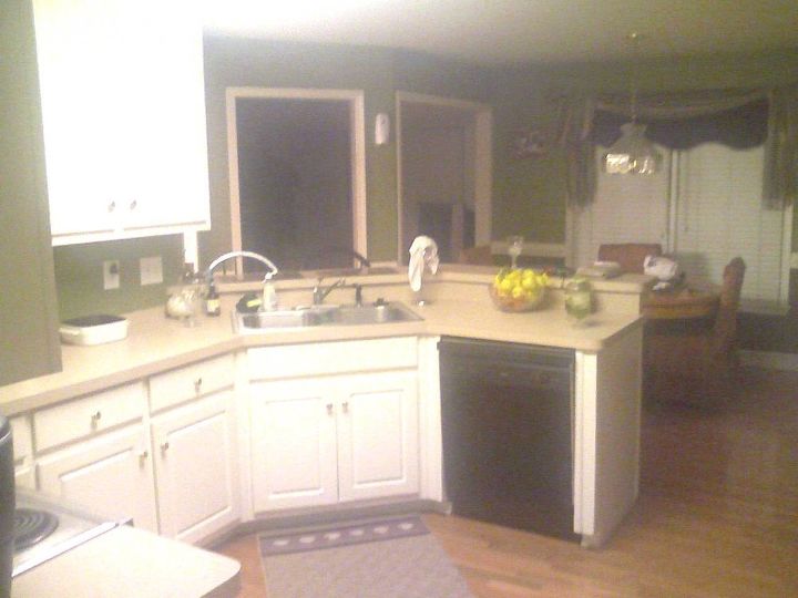 this is a kitchen cabinet refacing project we wanted to give the customer an, home decor, kitchen design, painting, Before The customer wanted an inexpensive way to make a change in the kitchen When we started there was way to much white no flavor at all