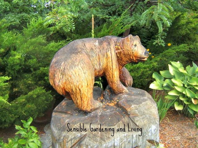 gardening with bears, gardening, pets animals, This handcrafted bear over sees the garden Probably the best kind of bear to have around