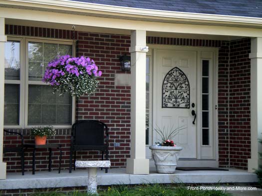 hanging baskets add wow to your porch, flowers, gardening, The simplicity and beauty of this single basket of petunias adds a charming burst of color to this attractive porch