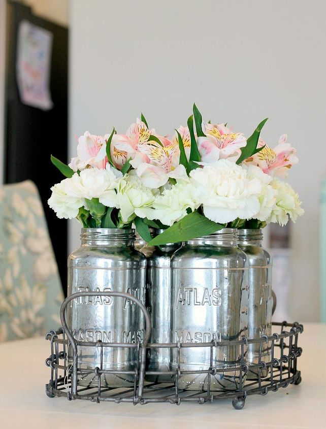 a brightened up dining area, home decor, shabby chic, Grocery store flowers look charming when arranged in repurposed spaghetti jars