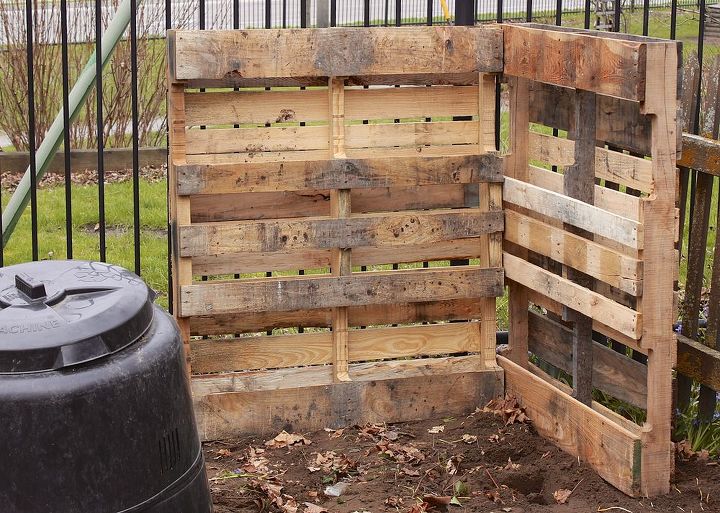how to build a composting system from pallets, composting, diy, gardening, go green, how to, pallet, repurposing upcycling, You ll need five pallets to get a two tiered system Start by creating a back wall and securing another pallet for a side wall