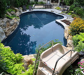 want to see an awesome pool and spa in a small backyard, landscape, outdoor living, ponds water features, pool designs, spas, Pool slide into this vinyl pool and spa