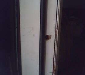 rebuildind doorway adding locks, doors, home maintenance repairs