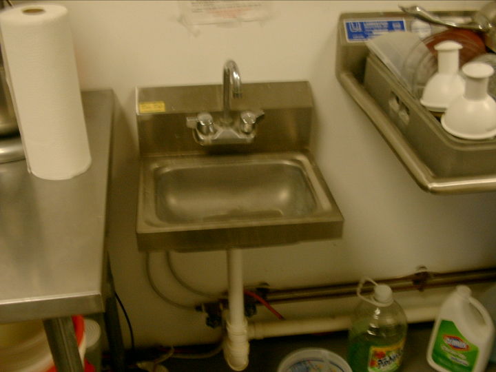 plumbing at the coffee shop, plumbing, This is a front view of the required handsink in the kitchen It is allowed to free flow into a floor receptor No trap is required but you could put one in if you desired