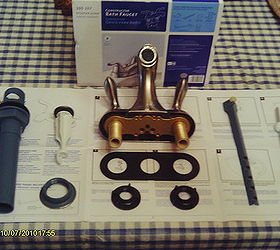 replacing a bathroom faucet, Laying out all components before you start helps make sure all is there and helps get familiar with the faucet assembly