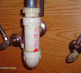 replacing a bathroom faucet, I disconnected the tw large plastic nuts and dropped the drain pipe out to install the new one Removing the flange was the most difficult WD40 was needed to unscrew the flange from the drainpipe
