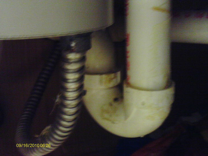 installing a garbage disposal, Drain attaches to P pipe