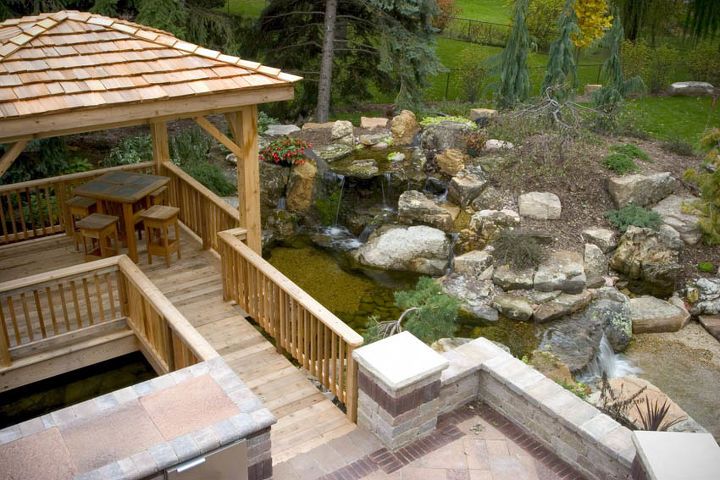 create a tropical dining spot in your backyard, decks, gardening, outdoor living, patio, ponds water features, A gazebo provides an intimate place for pondside dining