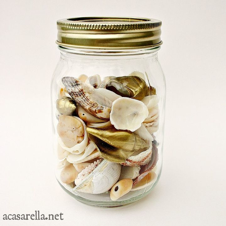 embracing gold in home decor, home decor, Shells from a recent beach trip are displayed in a gold lidded mason jar Look closely and you ll see that I painted some of the shells gold to tie the whole thing together