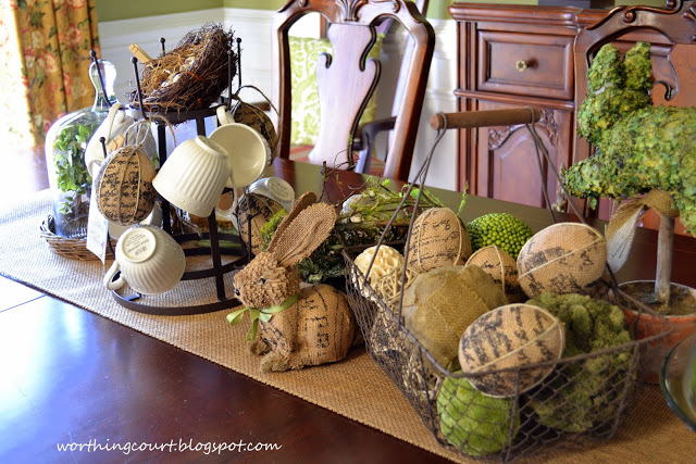 mi centro de mesa de pascua de arpillera y vintage, Huevos cubiertos de arpillera en una cesta de alambre envejecida combinada con orbes decorativos