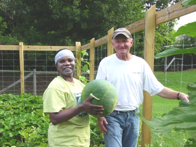 what is a master gardener anyway, flowers, gardening, landscape, outdoor living, McDaniel Farm Park Workday with prize watermelon 8 1 12 Courtesy of Gwinnett MG s