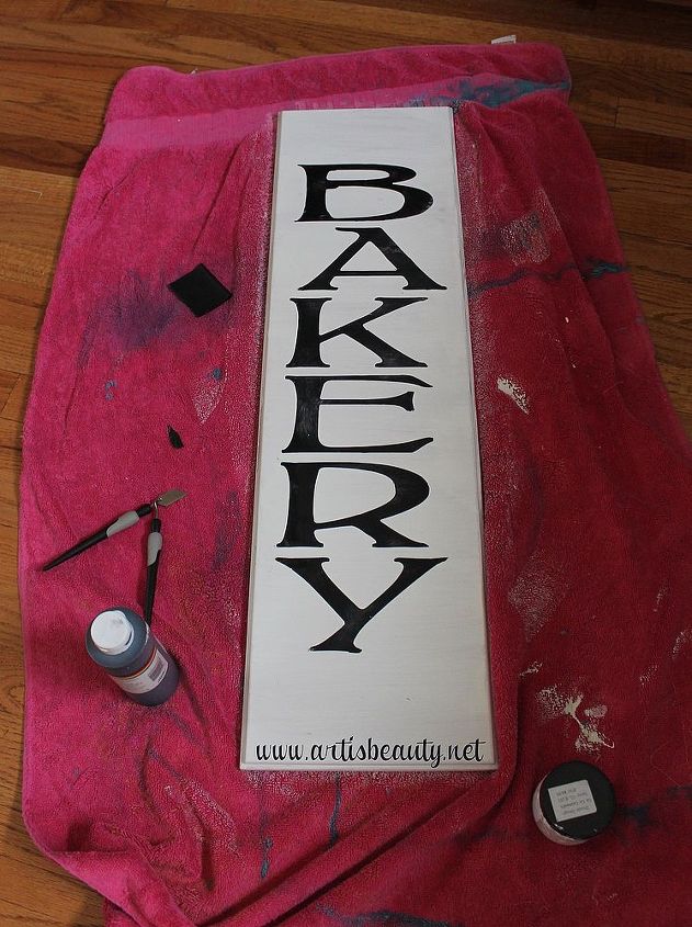 vintage styled bakery sign from recycled drawer front, crafts, home decor, painted furniture, Getting ready to wax and distress the sign and buff it