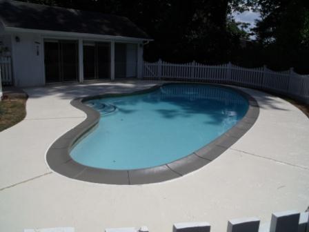 35 year old pool deck with rock finish and lots of joint problems before and after, decks, outdoor living, pool designs, After overlay and joint repairs then sealed