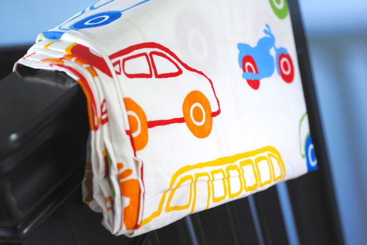 trains planes and cars themed boys room, bedroom ideas, home decor, A coverlet in bold and happy colors contributes to the fun transportation theme