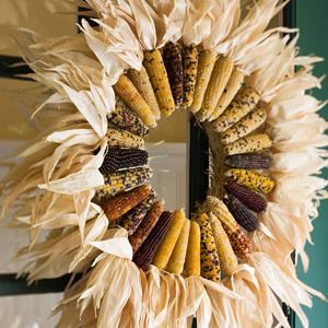 budget friendly fall decor, crafts, mason jars, outdoor living, seasonal holiday decor, wreaths, Indian corn is the easiest of all fall items to decorate with A wire frame with the Indian corn tied to it makes a beautifully colored wreath