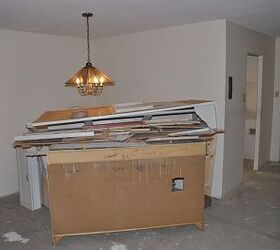 the start of a condo remodel, home improvement, kitchen design, 40 year old crappy kitchen cabinets staged for removal