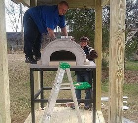 beautiful deck and roundboy oven installation, decks, outdoor living, woodworking projects, Just an afternoon and the help of a friend and the Roundboy oven is ready Each piece weighs around 70 lbs and no tools required