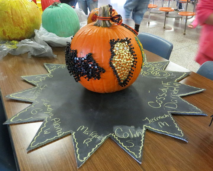decorate a pumpkin for halloween with thumbtacks, chalk paint, chalkboard paint, crafts, halloween decorations, seasonal holiday decor, An owl completes our design