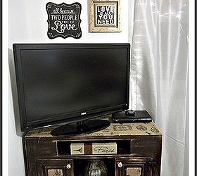 design on a dime rustic glam bedroom stage 1, bedroom ideas, home decor, painted furniture, rustic furniture, A t v console we ve had forever I redid with burlap and new knobs I distressed it because I wanted it to look as if it came out of a winery The burlap is wine labels