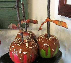 faux caramel apples, crafts, decoupage, seasonal holiday decor, Tie a ribbon on the stick