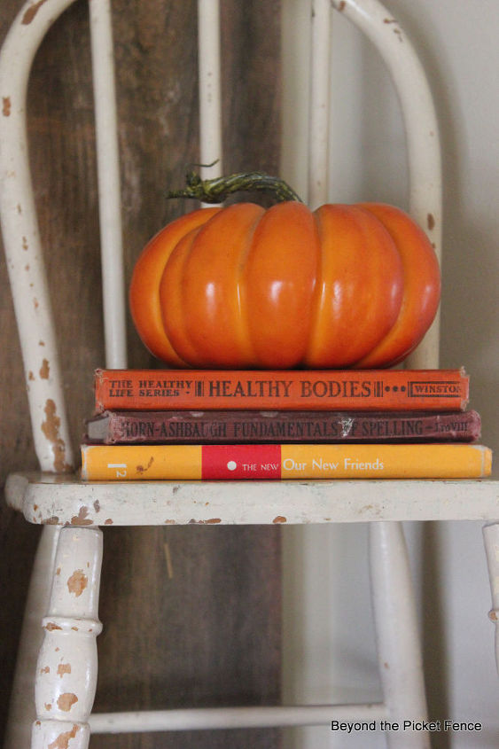 adding junk to your decor, seasonal holiday d cor, Old books add color and height